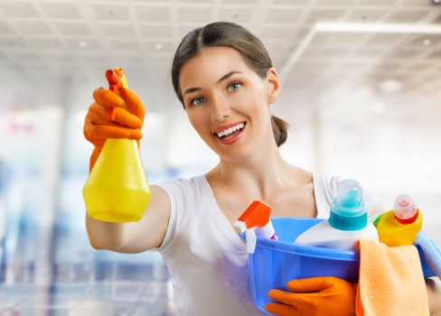 Carpet cleaning team preparing equipment safely before a job